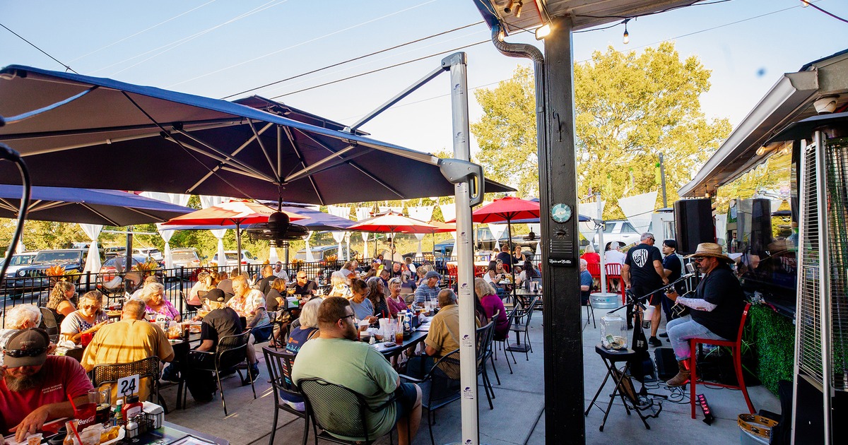 Outdoor seating area full of guests