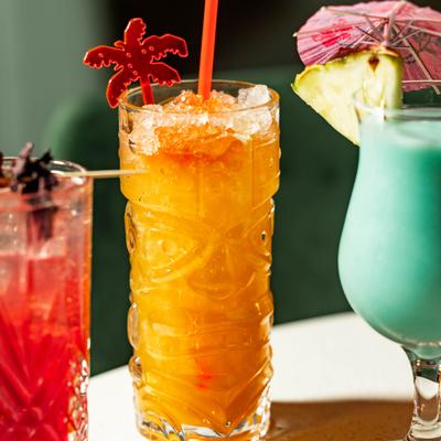 Various cocktails served on a table.