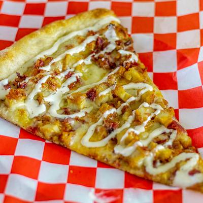 A slice of Buffalo Chicken pizza