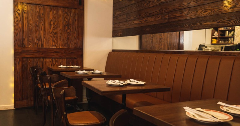 Interior, dinning area, tables and chairs, different angle