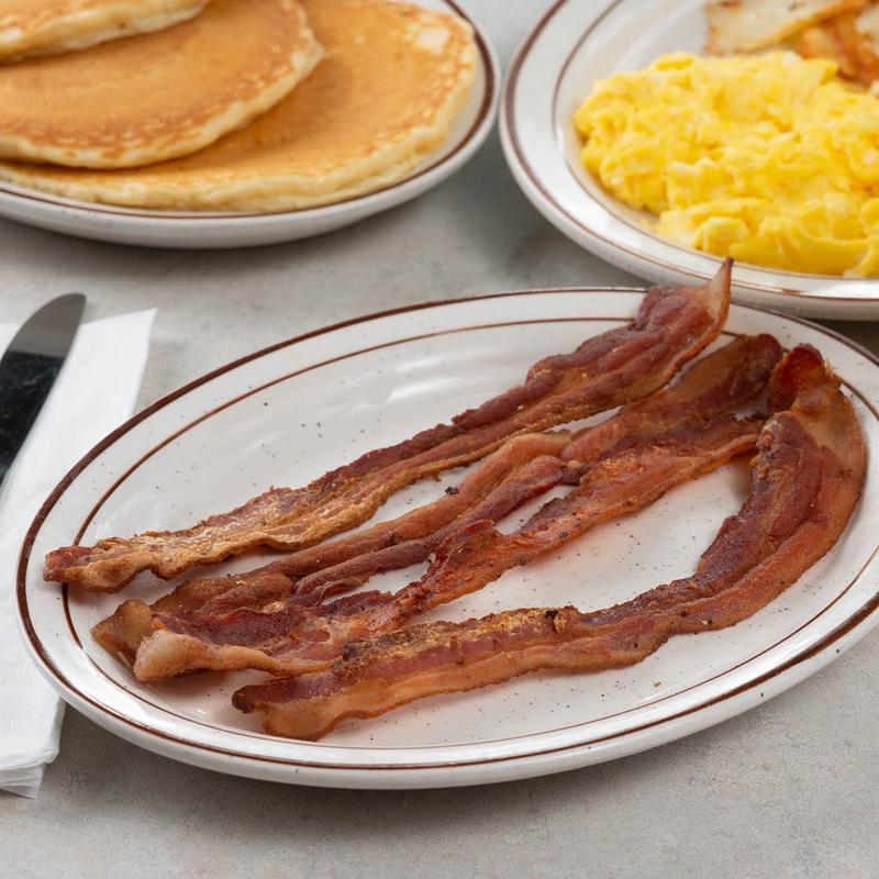 2 Eggs with Bacon (4) or Sausage Links (4) or Ham & Toast photo