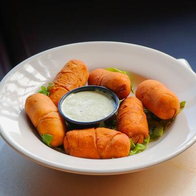 Served dough stuffed with queso blanco.