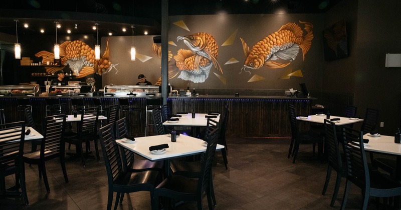 Murals of fish on walls in dining area