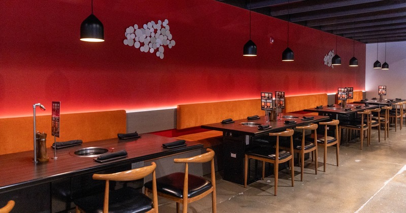 Interior, banquette seating, set tables ready for guests