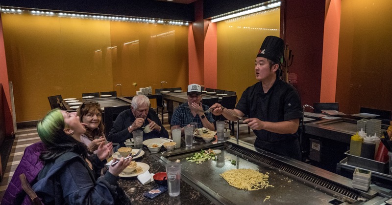 Interior, diner area, food prepare spot, chef, guests