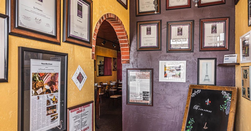 Newspaper inserts framed on the wall