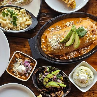 Mac 13, Surf & Turf Wet Burrito, Brussel Sprouts Side with Arroz Crema & Heirloom Beans.