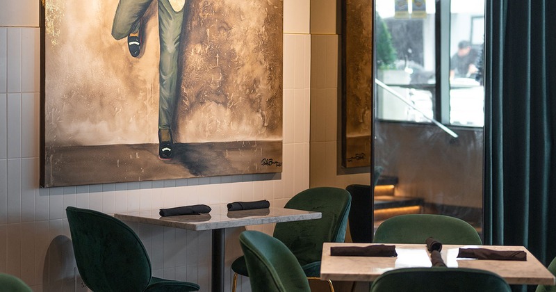 Interior, tables set for customers