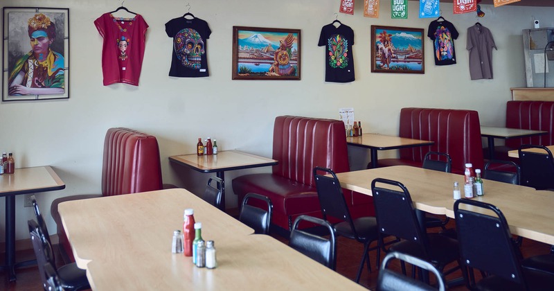 Interior, tables and chairs in dining area