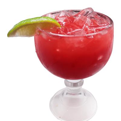 Strawberry Margarita served in a steamed glass with a lime wedge garnish.