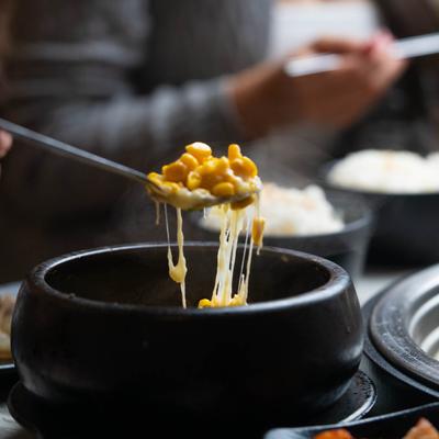 A spoonful of cheese soup.