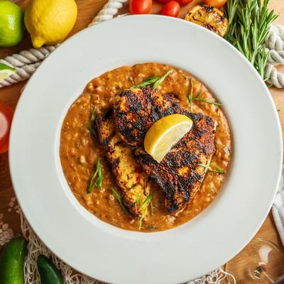 Blackened Swordfish in creamy sauce.