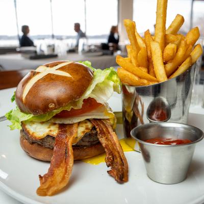 Cheeseburger, with BLT, onion, pickles, fried egg, fries and ketchup