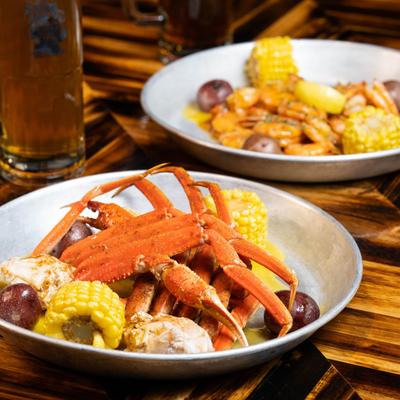 Steamed Crab, Peel and Eat Shrimp, and mug of beer.