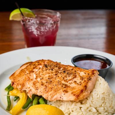 Thai Chili Salmon plate and a cocktail drink.