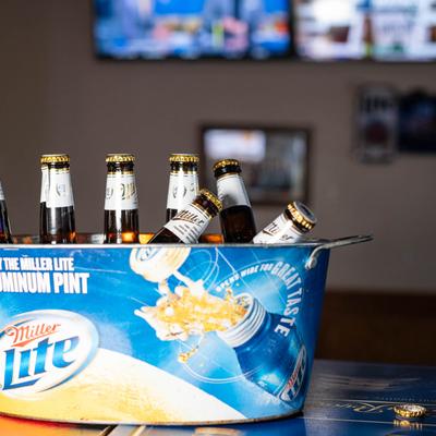 Bucket of bottled beer.