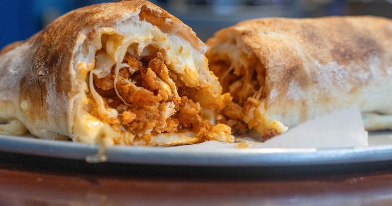 Calzone with crispy chicken and melted cheese