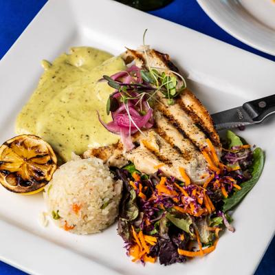 Grilled chicken with side salad and rice.