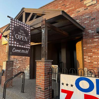 Exterior, entrance with a sign.