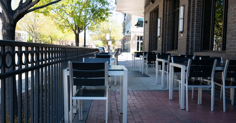 Outside, covered patio, tables and chairs