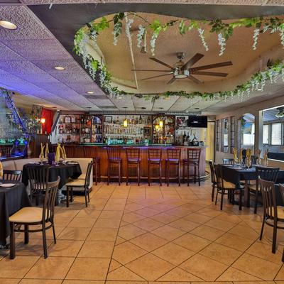 Interior, dining tables and bar.