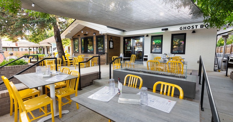 The outdoor space, patio with dining tables