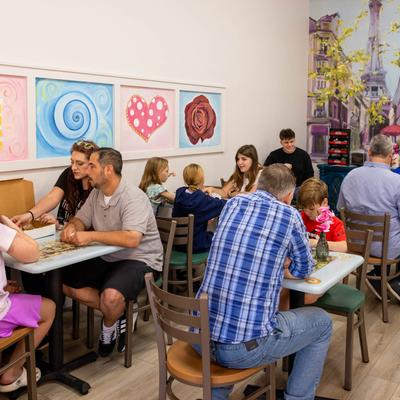 Customers at their tables.