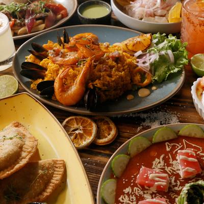 Assortment of dishes spread on a table.
