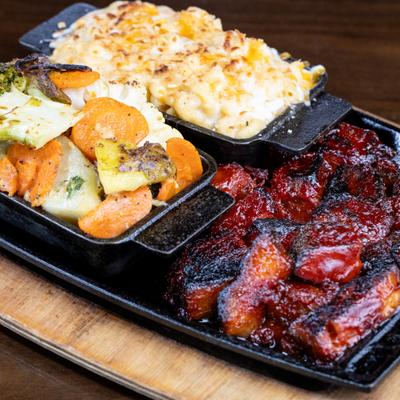 Brisket Burnt Ends served with two sides.