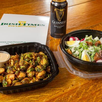 Grilled brussels sprouts, egg salad and a can of guiness.