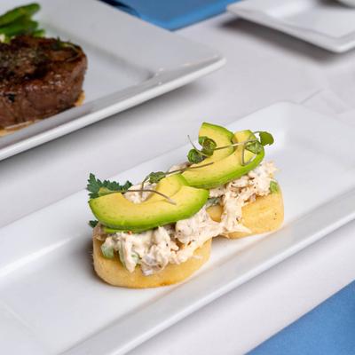 Arepa canapes, with chicken salad and avocado