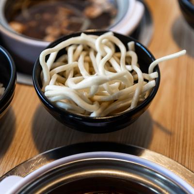 Noodles in a small bowl, closeup.