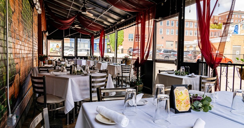 Exterior, tables with tableware and glasses