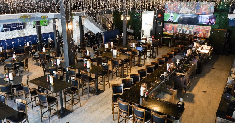 Interior, large dining area with holiday decorative lamps