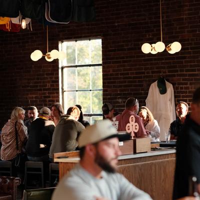 Customers sitting and drinking.