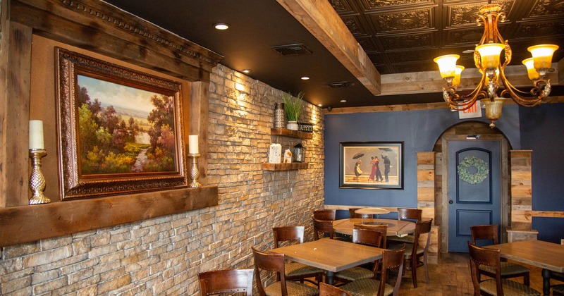 Interior, tables and chairs, pictures on the wall