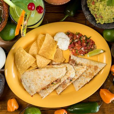 Quesadillas, with pico de gallo, sour cream and tortilla chips on the side