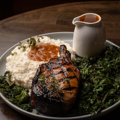 Grilled Pork Chop with Grits and Kale