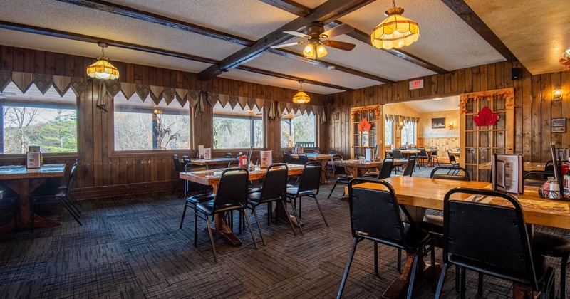 Interior, seating area with tables and chairs waiting for the guests