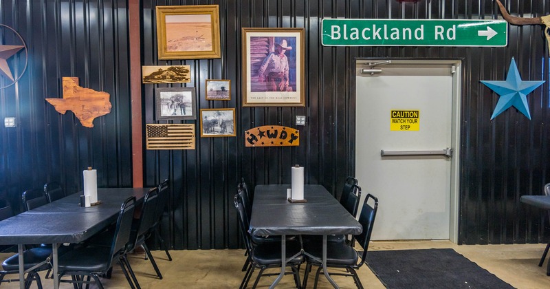 Interior, dining area, tables for six, ready for guests, pictures as a decoration