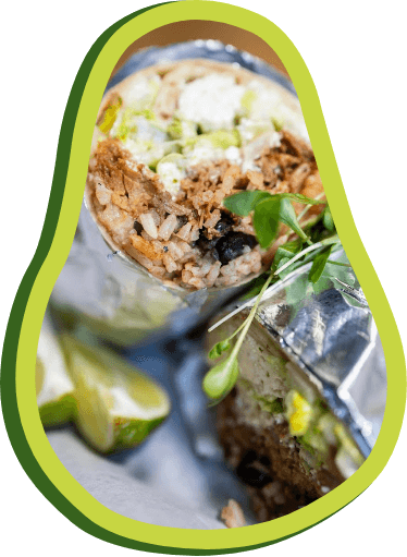Burrito filled with savory meat, melted cheese, and vegetables,