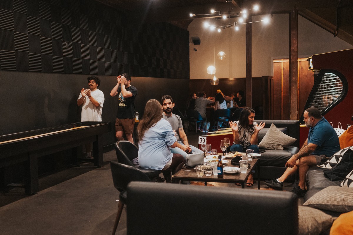 Interior, guests enjoying games