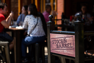 Stock & Barrel logo on a chair