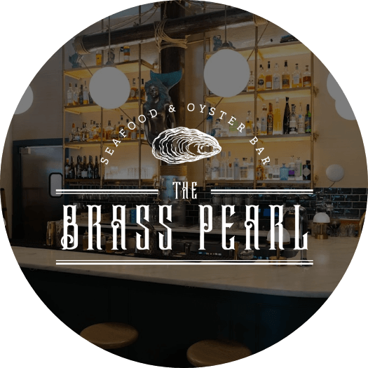 The Brass Pearl logo and interior