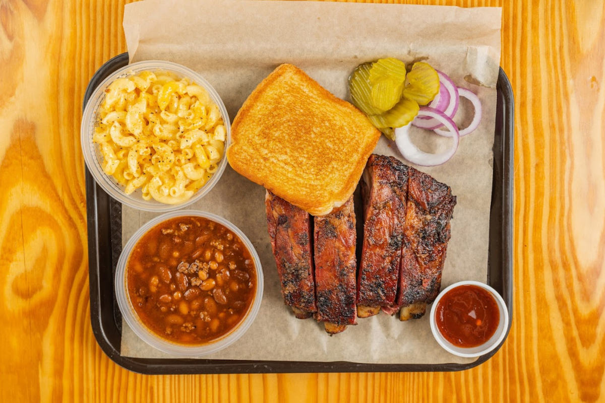 Ribs  served with mac and cheese and beans