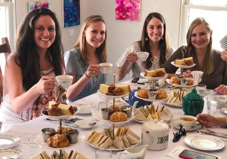 A group of women enjoying a tea party.