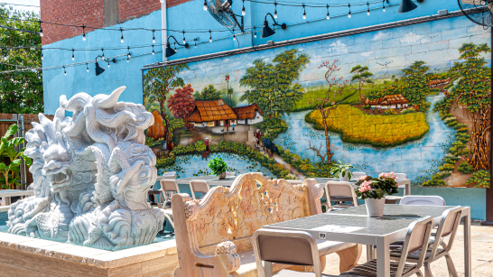 Outdoor, fountain, tables and mural