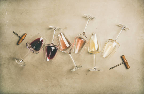 glasses of wine and corkscrew