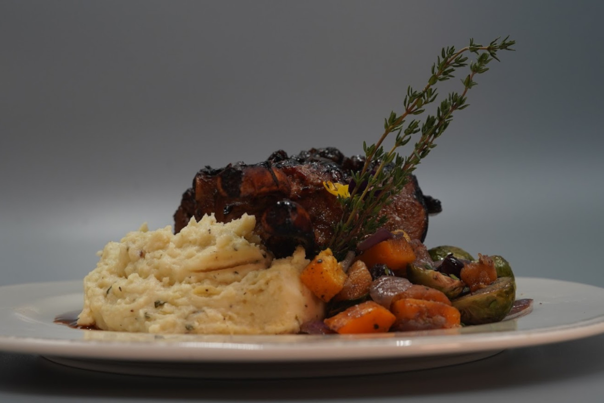 meat and vegetables on the white plate