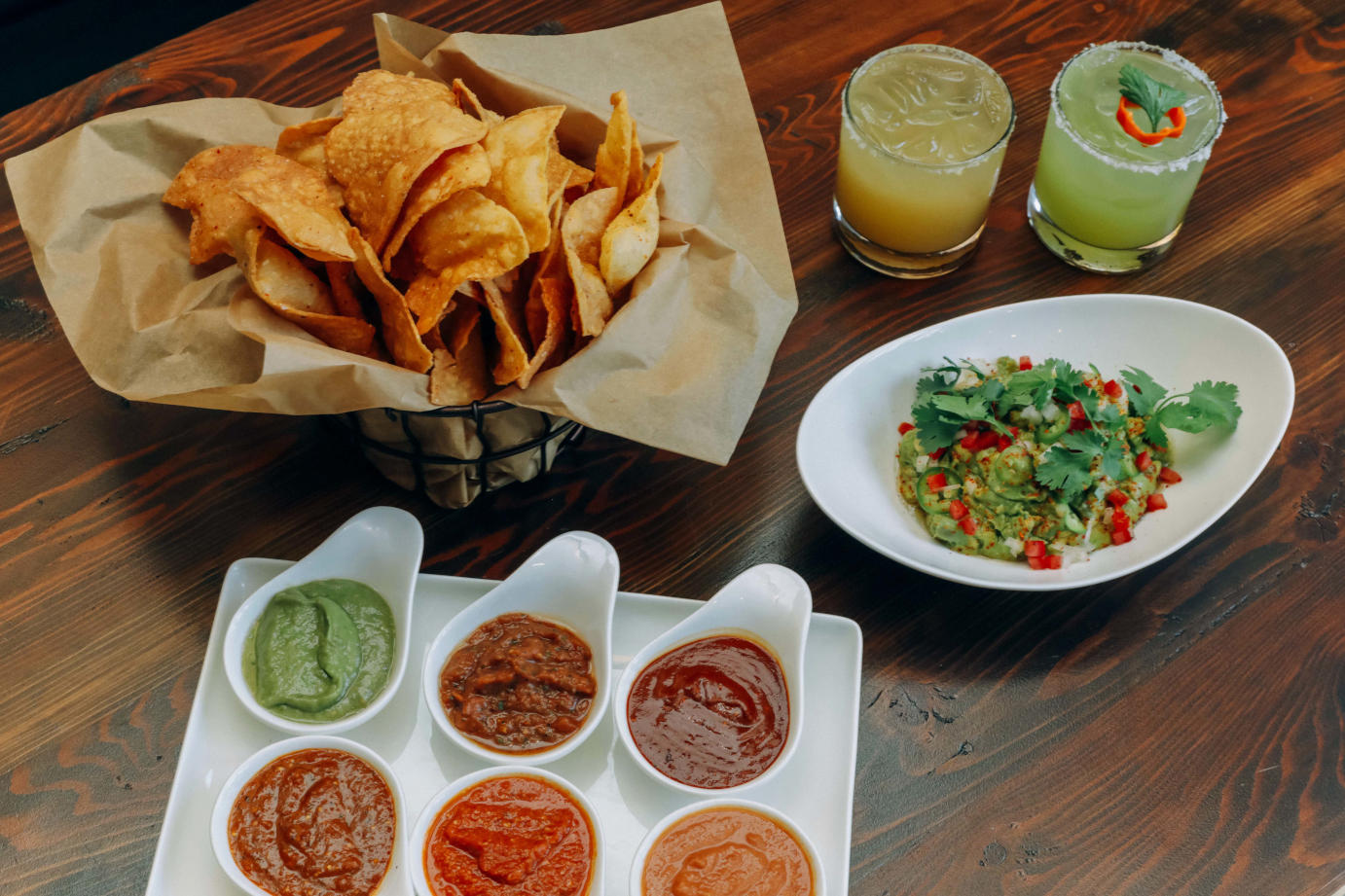 Nachos with dips and guac sauce